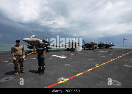 (190528) -- SINGAPOUR, le 28 mai 2019 -- cinq avions de chasse Rafale sont vus sur le pont d'envol du porte-avions français Charles de Gaulle amarré à la base navale de Changi, Singapour, le 28 mai 2019.) SINGAPOUR-FRANCE-MARITIME-DEFENCE ThenxChihxWey PUBLICATIONxNOTxINxCHN Banque D'Images