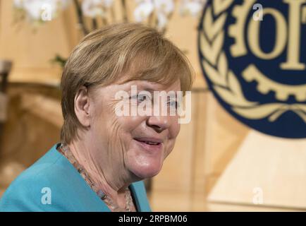 (190611) -- GENÈVE, 11 juin 2019 (Xinhua) -- la chancelière allemande Angela Merkel participe à la 108e session de la Conférence internationale du travail à Genève, Suisse, le 11 juin 2019. Angela Merkel a déclaré mardi que le monde doit continuer à travailler pour améliorer les conditions de travail et transformer la croissance économique en progrès social. (Xinhua/Xu Jinquan) SUISSE-GENÈVE-CONFÉRENCE INTERNATIONALE du travail-MERKEL PUBLICATIONxNOTxINxCHN Banque D'Images