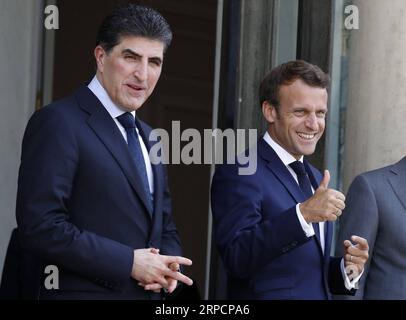 (190710) -- PARIS, 10 juillet 2019 (Xinhua) -- le président français Emmanuel Macron (à droite) et Nechirvan Barzani, président de la région semi-autonome irakienne du Kurdistan, sont photographiés après leur rencontre à l'Elysée à Paris, France, le 10 juillet 2019. (Xinhua/Jack Chan) FRANCE-PARIS-MACRON-IRAK-BARZANI-MEETING PUBLICATIONxNOTxINxCHN Banque D'Images