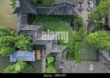 (190711) -- CHONGQING, 11 juillet 2019 -- une photo aérienne prise le 10 juillet 2019 montre le paysage du parc national des zones humides de Xiuhu dans le district de Bishan, au sud-ouest de la Chine à Chongqing.) CHINA-CHONGQING-BISHAN-WETLAND PARK-SCENERY (CN) LIUXCHAN PUBLICATIONXNOTXINXCHN Banque D'Images