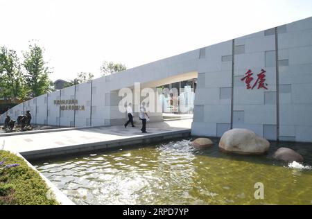 Libyen, Kämpfe in der Umgebung des Flughafens von Tripolis (190726) -- CHONGQING, le 26 juillet 2019 -- visite du jardin de Chongqing à l'exposition internationale d'horticulture de Beijing, capitale de la Chine, le 25 juillet 2019. Située dans le sud-ouest de la Chine, Chongqing est la seule municipalité du centre et de l'ouest de la Chine. Construite sur les montagnes et partiellement entourée par les rivières Yangtze et Jialing, elle est connue comme une ville de montagne et une ville sur les rivières. Il sert de centre économique et culturel majeur dans l'ouest de la Chine. Avec ses caractéristiques topographiques spéciales, Chongqing a le paysage unique de mou Banque D'Images