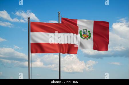 Drapeau du Pérou et de l'Autriche agitant ensemble dans le vent sur le ciel bleu, concept de coopération de deux pays Banque D'Images