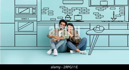 Couple indien serrant près du mur avec illustration de la salle de cuisine Banque D'Images