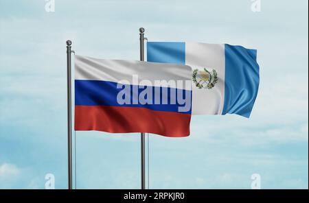 Drapeau du Guatemala et drapeau de la Russie agitant ensemble sur le ciel bleu, concept de coopération de deux pays Banque D'Images