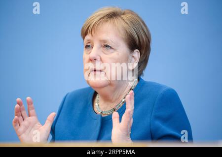 200311 -- BERLIN, le 11 mars 2020 -- la chancelière allemande Angela Merkel assiste à une conférence de presse sur la situation du COVID-19 en Allemagne, à Berlin, capitale de l'Allemagne, le 11 mars 2020. La chancelière allemande Angela Merkel a déclaré lors d’une conférence de presse mercredi que des mesures drastiques étaient nécessaires pour ralentir la propagation du nouveau coronavirus. ALLEMAGNE-BERLIN-COVID-19-CONFÉRENCE DE PRESSE ShanxYuqi PUBLICATIONxNOTxINxCHN Banque D'Images