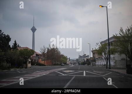 200326 -- TÉHÉRAN, 26 mars 2020 -- une photo prise le 25 mars 2020 montre une rue vide à Téhéran, en Iran. Le nombre de morts du nouveau coronavirus en Iran est passé à 2 234 jeudi avec 157 nouveaux décès, a déclaré le ministère de la Santé. Kianush Jahanpur, chef du Centre de relations publiques et d’information du ministère de la Santé et de l’éducation médicale, a également annoncé 2 389 nouveaux cas de COVID-19, portant le nombre total d’infections à 29 406. Photo de /Xinhua IRAN-TEHRAN-COVID-19 AhmadxHalabisaz PUBLICATIONxNOTxINxCHN Banque D'Images