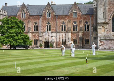 Croquet sur la pelouse des Bishops Palace Wells Banque D'Images