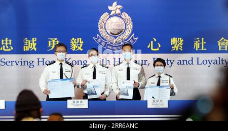 210203 -- BEIJING, le 3 février 2021 -- Chris Tang Ping-keung 2nd L, commissaire de police du gouvernement de la région administrative spéciale de Hong Kong, assiste à une conférence de presse à Hong Kong, dans le sud de la Chine, le 2 février 2021. La police de Hong Kong a arrêté 97 personnes depuis juin 2020 soupçonnées d'avoir enfreint la loi sur la sécurité nationale à Hong Kong, a déclaré Chris Tang Ping-keung mardi. PHOTOS XINHUA DU JOUR LixGang PUBLICATIONxNOTxINxCHN Banque D'Images