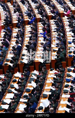 210308 -- BEIJING, le 8 mars 2021 -- les députés du 13e Congrès national populaire participent à la deuxième séance plénière de la quatrième session du 13e Congrès national populaire au Grand Hall du peuple à Beijing, capitale de la Chine, le 8 mars 2021. DEUX SESSIONSCHINA-BEIJING-NPC-SESSION ANNUELLE-DEUXIÈME RÉUNION PLÉNIÈRE CN YANXYAN PUBLICATIONXNOTXINXCHN Banque D'Images