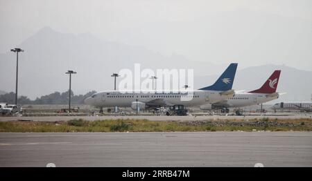 210831 -- KABOUL, 31 août 2021 -- une photo prise le 31 août 2021 montre des avions de passagers à Kaboul, capitale de l'Afghanistan. Le Commandement central américain a annoncé lundi que le retrait des troupes américaines d'Afghanistan était terminé. Photo de /Xinhua AFGHANISTAN-KABOUL-AIRPORT-U.S. SEVRAGE SaifurahmanxSafi PUBLICATIONxNOTxINxCHN Banque D'Images