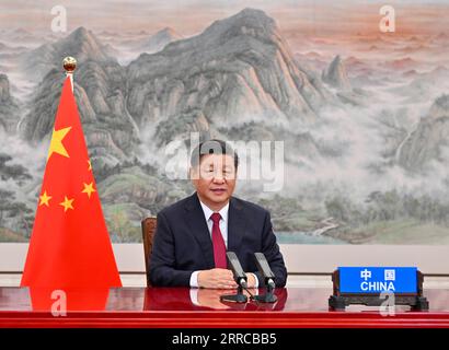 211030 -- BEIJING, le 30 octobre 2021 -- le président chinois Xi Jinping s'adresse à la première session du 16e Sommet des dirigeants du G20 du Groupe des 20 par liaison vidéo à Beijing, capitale de la Chine, le 30 octobre 2021. CHINE-PÉKIN-XI SOMMET JINPING-G20 CN LIXXUEREN PUBLICATIONXNOTXINXCHN Banque D'Images