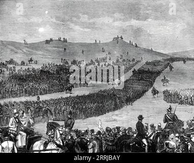 La revue des bénévoles à Tring le lundi de Pâques : la marche passée à Beacon Hill, 1876. 'La revue et la bataille imitée du corps de volontaires des comtés métropolitains et d'origine... a eu lieu dans Ashridge Park... de grandes plaques de neige se trouvaient encore sur les pentes, et une partie du sol... était épaisse argile, [mais] le sol et le temps étaient tous deux favorables pour les opérations. La tête de Beacon Hill... est remarquablement comme le site d'un roman camp...between il et la première des étapes il y a une vallée bien abritée... il serait, peut-être, aller trop loin pour dire que l'attaque a entièrement réussi ; mais certainement Banque D'Images