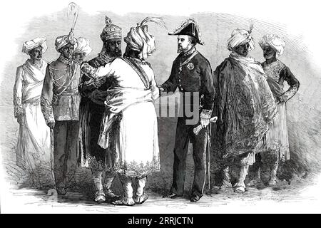 Rajahs se sont présentés en attendant le prince de Galles à Calcutta, d'après un croquis de l'un de nos artistes spéciaux, 1876. Visite royale du futur roi Édouard VII en Inde. "Peu après trois, les chefs indigènes et les fonctionnaires qui avaient été invités à la plate-forme de réception ont commencé à arriver. L'un des premiers à venir fut le Maharajah de Rewah, resplendissant dans une robe de mauve brodée d'or. A peine moins splendides étaient Scindia et le Maharajah de Jeypore ; tandis que, d'autre part, Holkar et Sir Salar Jung présentaient un contraste frappant avec l'extrême simplicité de la Banque D'Images