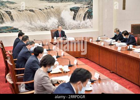 230314 -- BEIJING, 14 mars 2023 -- Zhao Leji, le président nouvellement élu du Comité permanent de l'Assemblée populaire nationale, préside la première réunion du Conseil des présidents du 14e Comité permanent de l'Assemblée populaire nationale au Grand Hall du peuple à Beijing, capitale de la Chine, le 14 mars 2023. CHINA-BEIJING-NPC-ZHAO LEJI-REUNION CN LIXTAO PUBLICATIONXNOTXINXCHN Banque D'Images