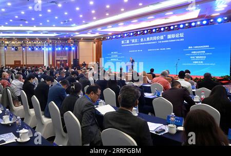 230323 -- BEIJING, le 23 mars 2023 -- des invités assistent à la cérémonie d'ouverture d'un forum international sur la démocratie à Beijing, capitale de la Chine, le 23 mars 2023. Le Forum international sur la démocratie : les valeurs humaines partagées, qui se tient en ligne et hors ligne, est le deuxième du genre. CHINA-BEIJING-INT L FORUM SUR LA DEMOCRATIONIE D'OUVERTURE CN CHENXYEHUA PUBLICATIONXNOTXINXCHN Banque D'Images