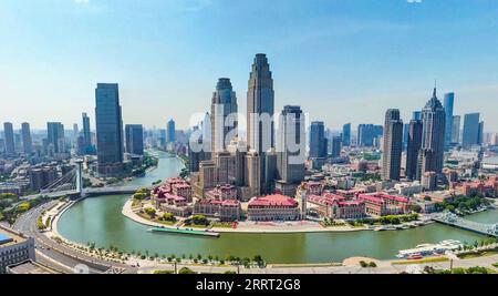 230625 -- TIANJIN, le 25 juin 2023 -- cette vue aérienne prise le 24 juin 2023 montre une vue de la municipalité de Tianjin dans le nord de la Chine. La 14e réunion annuelle des nouveaux champions, également connue sous le nom de Forum de Davos d’été, se tiendra à Tianjin du 27 au 29 juin. Environ 1 500 dirigeants des secteurs public et privé de plus de 90 pays se réuniront pour cet événement de trois jours. CHINE-TIANJIN-VUE AÉRIENNE CN SunxFanyue PUBLICATIONxNOTxINxCHN Banque D'Images