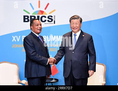 230824 -- JOHANNESBURG, le 24 août 2023 -- le président chinois Xi Jinping rencontre le président de la République du Congo Denis Sassou Nguesso en marge du 15e sommet des BRICS à Johannesburg, en Afrique du Sud, le 24 août 2023. AFRIQUE DU SUD-JOHANNESBURG-XI JINPING-RÉPUBLIQUE DU CONGO-PRÉSIDENT-RÉUNION XIEXHUANCHI PUBLICATIONXNOTXINXCHN Banque D'Images