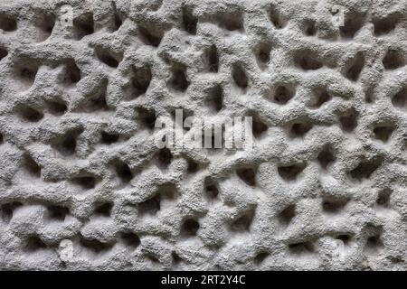 Mur de pierre poreuse texture de fond avec des trous Banque D'Images
