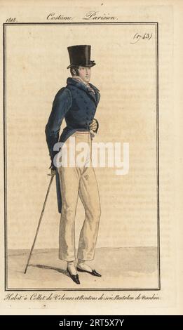 Gentleman français en chapeau haut de gamme, tailcoat avec col en velours et boutons en soie, pantalon Nankeen en coton, tenant une canne. Habit a collet de velours et boutons de soie, pantalon de Nankin. Gravure sur cuivre coloriée à la main d’après une assiette mode de Louis Marie Lante du Journal des Dames et des modes de Pierre de la Mesangere, Magazine des femmes et de la mode, Paris, 1818. Banque D'Images