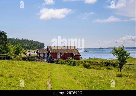 Øitangen sur Jomfruland est un groupe de cabines d'hébergement et de services gérés par l'Association norvégienne de trekking pour les visiteurs de l'île. Norvège. Banque D'Images