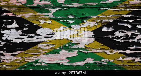 Drapeau de la Jamaïque peint sur une planche de bois grunge. Banque D'Images