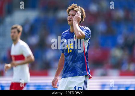 GENK, BELGIQUE - 12 SEPTEMBRE : Atsuki Ito du Japon se frottant la tête lors du match amical international entre Turkiye et le Japon au Cegeka Arena le 12 septembre 2023 à Genk, Belgique. (Photo de Joris Verwijst/BSR Agency) Banque D'Images