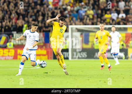 Andrei Burca de Roumanie et Milot Rashica du Kosovo lors de l'UEFA Euro 2024, qualifications européennes, match de football du groupe I entre la Roumanie et le Kosovo le 12 septembre 2023 à l'Arena Nationala de Bucarest, Roumanie Banque D'Images