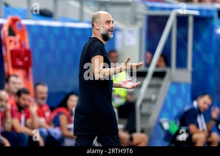 Athènes, Grèce - 16 août 2023 : : l'entraîneur de Manchester City Josep Guardiola lors de la finale de la Super coupe de football entre Manchester City et Séville AT Banque D'Images