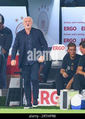 Rudi Völler, Voeller (entraîneur DFB Interims et DFB Sportdirektor), Sandro Wagner, Hannes Wolf, entraîneur adjoint DFB dans le match amical ALLEMAGNE - FRANCE 2-1 DEUTSCHLAND - FRANKREICH 2-1 préparation pour les Championnats d'Europe 2024 en Allemagne, saison 2023/2024, le 12 septembre 2023 à Dortmund, Allemagne. © Peter Schatz / Alamy Live News Banque D'Images