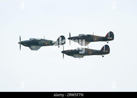 Un trio de Hawker Hurricane pendant le Battle of Britain Air Show à l'IWM Duxford. Date de la photo : Samedi 16 septembre 2023. Banque D'Images