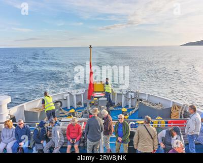 Passagers du ferry Scillonian III lors de sa traversée de l'océan Atlantique de St Mary's, îles Scilly à Penzance, Cornouailles, Angleterre. Banque D'Images