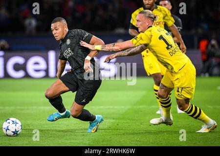 Paris, France, France. 19 septembre 2023. Kylian MBAPPE du PSG et Marius WOLF du Borussia Dortmund lors du match du groupe F de l'UEFA Champions League entre le Paris Saint-Germain et le Borussia Dortmund au Parc des Princes Stadium le 19 septembre 2023 à Paris, France. (Image de crédit : © Matthieu Mirville/ZUMA Press Wire) USAGE ÉDITORIAL SEULEMENT! Non destiné à UN USAGE commercial ! Banque D'Images