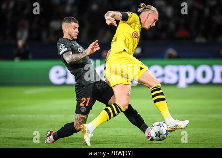 Paris, France, France. 19 septembre 2023. Lucas HERNANDEZ du PSG et Marius WOLF du Borussia Dortmund lors du match de groupe F de l'UEFA Champions League entre le Paris Saint-Germain et le Borussia Dortmund au Parc des Princes Stadium le 19 septembre 2023 à Paris. (Image de crédit : © Matthieu Mirville/ZUMA Press Wire) USAGE ÉDITORIAL SEULEMENT! Non destiné à UN USAGE commercial ! Banque D'Images