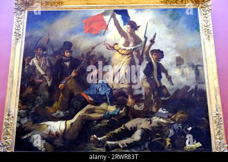 Liberté conduisant le peuple peinture par Eugène Delacroix au Louvre à Paris France Banque D'Images