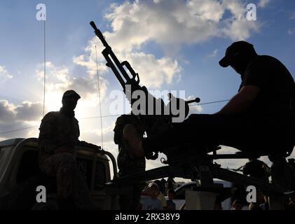 Gaza, Palestine. 20 septembre 2023. Des Palestiniens et des militants des factions palestiniennes participent à l’inauguration du mémorial pour commémorer le 18e anniversaire du retrait israélien de la bande de Gaza près du point de passage de Rafah, dans le sud de la bande de Gaza. (Photo Yousef Masoud/SOPA Images/Sipa USA) crédit : SIPA USA/Alamy Live News Banque D'Images