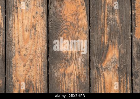 Fond de texture de vieilles planches de bois orange délavé Banque D'Images