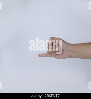 symbole de petit doigt sur un fond blanc Banque D'Images