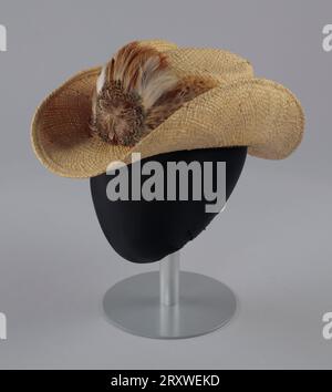Chapeau de cow-boy en paille avec bande de chapeau à plumes portée par Arthur Lee ca. 2000 Banque D'Images
