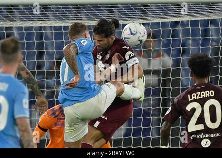 Rome, Italie. 27 septembre 2023, Ciro immobile (SS Lazio) ; Ricardo Rodriguez (Torino FC) lors de la Ligue italienne de football Un match 2023/2024 entre SS Lazio et Torino FC au stade Olimpic de Rome le 27 septembre 2023. Banque D'Images