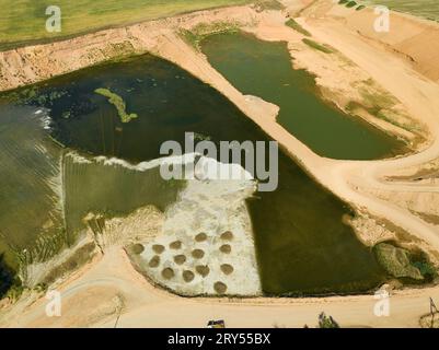 Paysage de sable et processus d'exploitation minière et de production de produits Banque D'Images