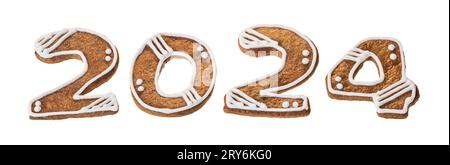 Gros plan des chiffres en pain d'épice pour 2024 Happy New Year isolé sur fond blanc. Ensemble de biscuits décorés cuits au four de la forme de numéro deux, zéro ou quatre. Banque D'Images