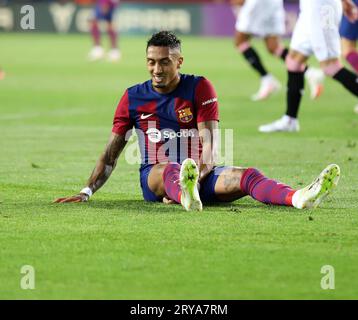 Sabadell, Barcelone, Espagne. 29 septembre 2023. Barcelone Espagne 29.09.2023 Raphinha (FC Barcelone) tombe blessé lors de la Liga EA Sports entre le FC Barcelone et le Sevilla FC à Estadi Olimpic Lluis Companys le 29 septembre 2023 à Barcelone. (Image de crédit : © Xavi Urgeles/ZUMA Press Wire) USAGE ÉDITORIAL SEULEMENT! Non destiné à UN USAGE commercial ! Banque D'Images