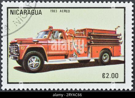 Timbre postal annulé imprimé par le Nicaragua, qui montre Fire Engine, vers 1983. Banque D'Images