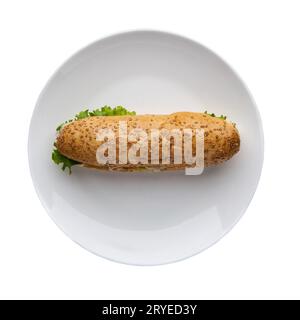 Hot dog sur une assiette blanche Banque D'Images