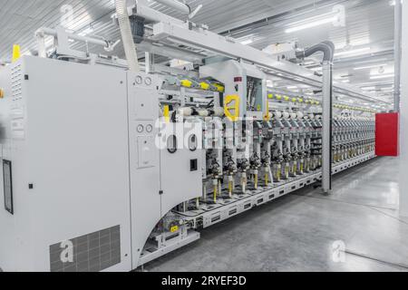 Production de fils dans une usine textile Banque D'Images