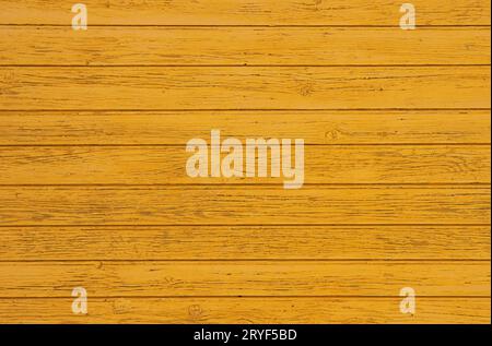 Arrière-plan de planches de bois peintes en jaune Banque D'Images