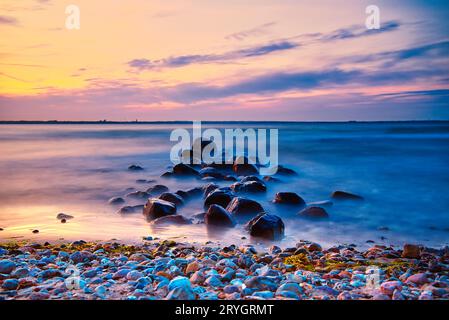 Coucher de soleil sur la plage de Niendorf Banque D'Images