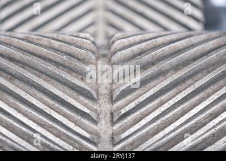 Arrière-plan abstrait de roues dentées sales engrenage en spirale en métal texturé Banque D'Images