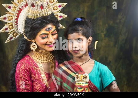 Un concept Agomoni photoshoot pour les enfants défavorisés Unloved. Maa Durga agomoni shoot concept.Culture indienne durga puja.. Banque D'Images