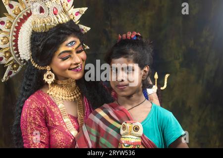 Un concept Agomoni photoshoot pour les enfants défavorisés Unloved. Maa Durga agomoni shoot concept.Culture indienne durga puja.. Banque D'Images